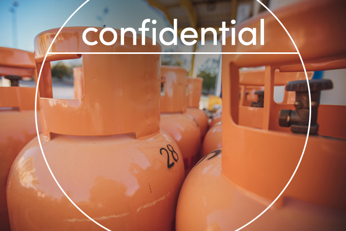 Orange propane tanks with text overlaid: Confidential